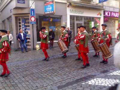 The parade on Rue du Marche aux Herbes