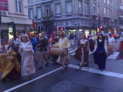 Towns people on Rue du Lombard