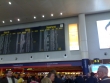 Our delayed flight is listed as the last item on the board