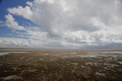 Rain showers arriving over the rocks at low tide (Corumbau, Bahia, Brazil)