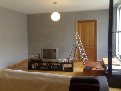 Still a work in progress: The living area (with the first coat of paint)